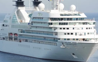 Cruise ship on calm waters, representing maritime travel and potential personal injury cases related to cruise lines, relevant to Perkins Law Offices' focus on personal injury law.